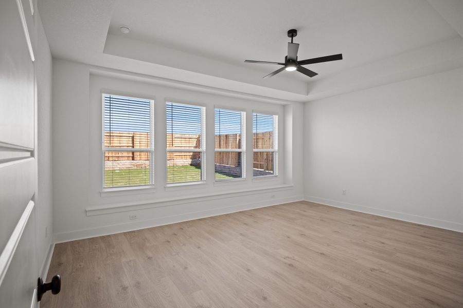 Representative unfurnished interior of a home built from the Farris by Chesmar Homes in The Grove at Blackhawk, Pflugerville (Image 10).