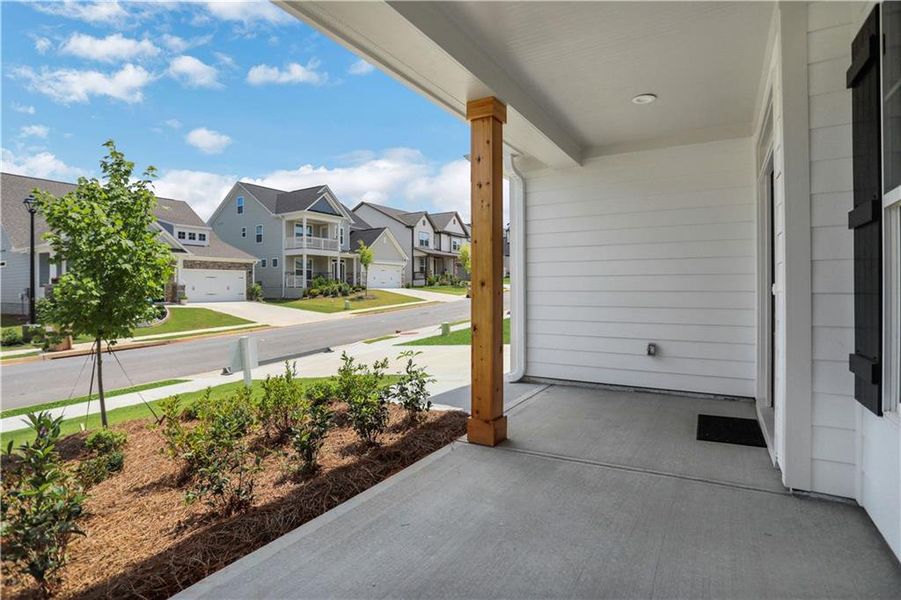 Exterior details and patio area of a home in Twin Lakes, Hoschton (Image 21).
