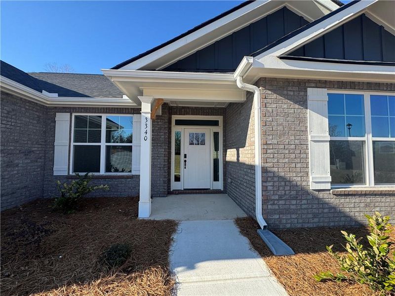 Exterior details and patio area of a home in Tuscany Hills, Douglasville (Image 18).