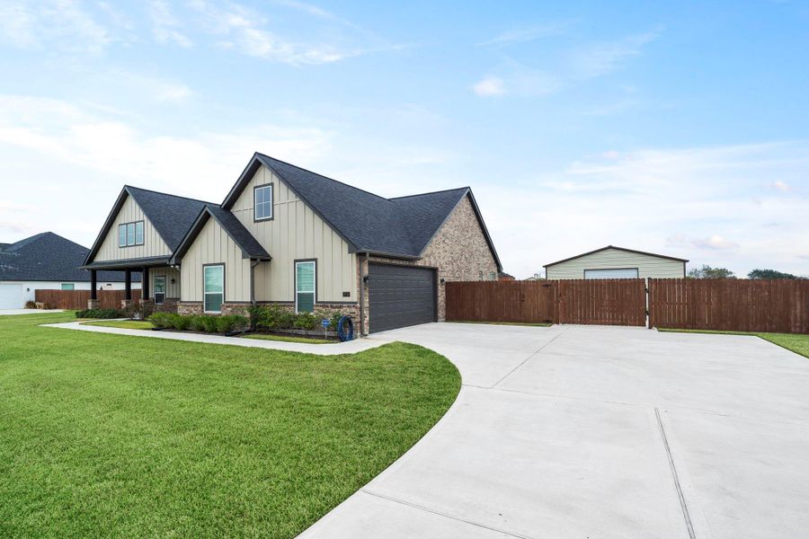 Front exterior of a new home in , Needville, TX, highlighting curb appeal (Image 26). Front exterior of a new home in , Needville, TX, highlighting curb appeal (Image 26).