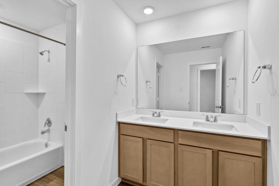 Furnished interior view inside a new home in Grand West, Houston (Image 14).