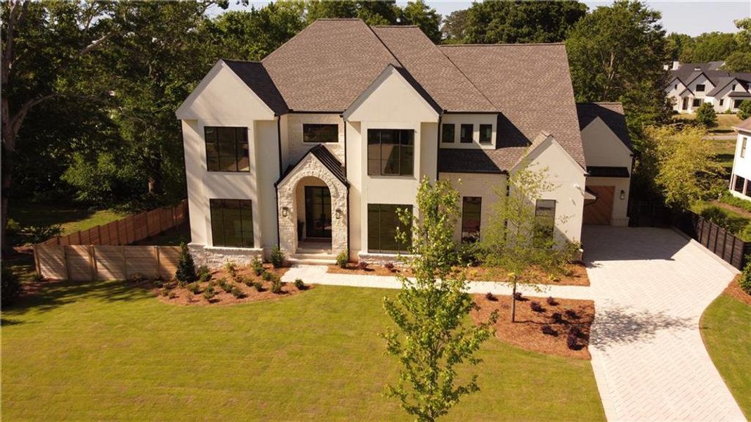 Front exterior of a new home in , Alpharetta, GA, highlighting curb appeal (Image 1). Front exterior of a new home in , Alpharetta, GA, highlighting curb appeal (Image 1).
