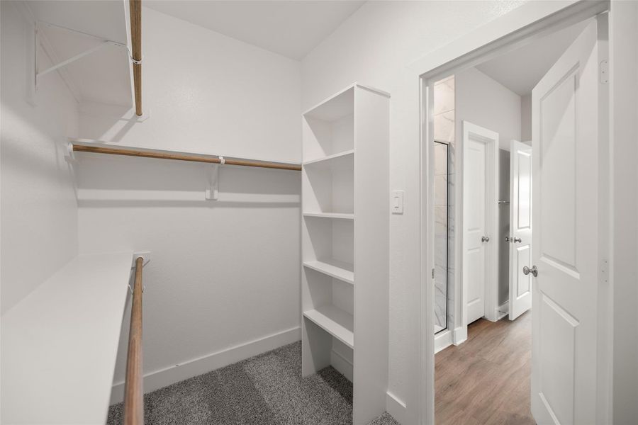 Oversized walk-in closet provides excellent storage and organization. Oversized walk-in closet provides excellent storage and organization.