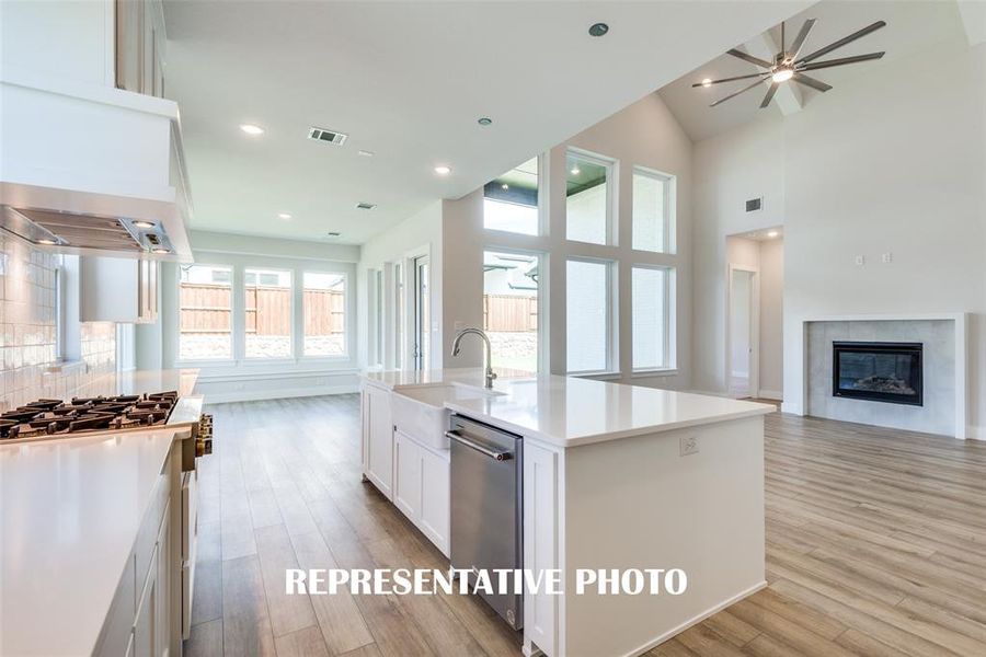 With the perfect open concept design, entertaining is a breeze in our Addison II floor plan.  REPRESENTATIVE PHOTO.