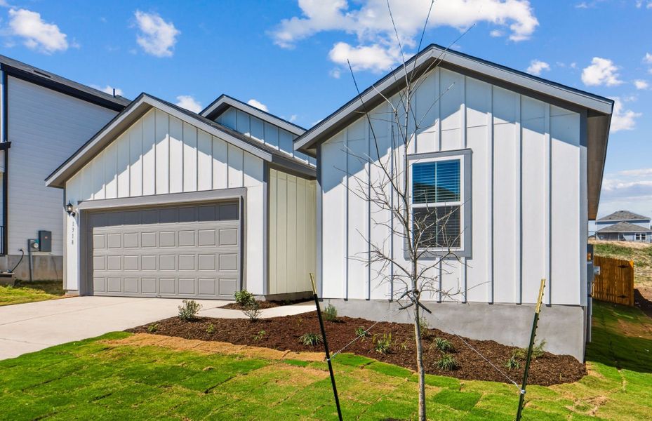 Front exterior of a new home in Skyview, Belton, TX, highlighting curb appeal (Image 17).