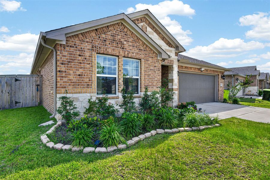Front exterior of a new home in Wall Street Village, Richmond, TX, highlighting curb appeal (Image 23).