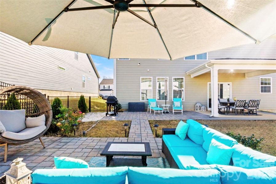 Exterior details and patio area of a home in Sylvan Creek, Denver (Image 30).