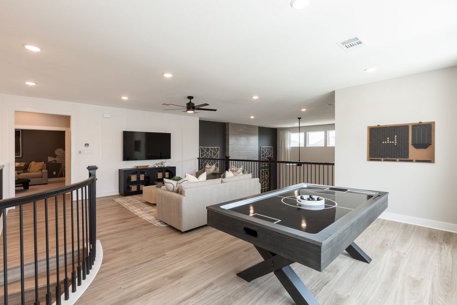 Representative furnished interior of a home built from the Camden by Tri Pointe Homes in Bridgeland, Cypress (Image 43).