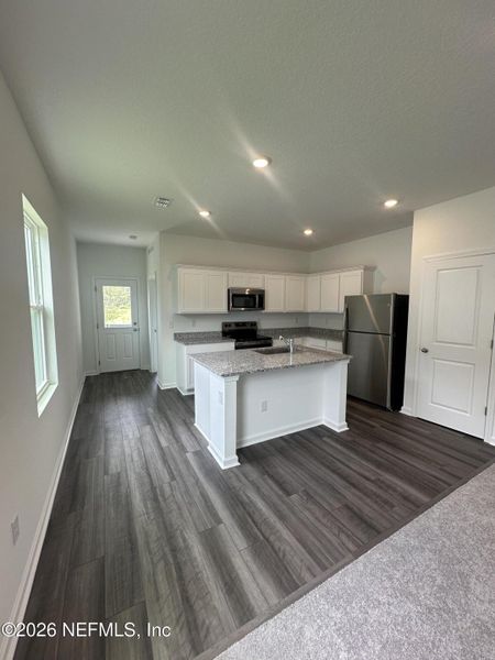 Furnished interior view inside a new home in , Palm Coast (Image 6).