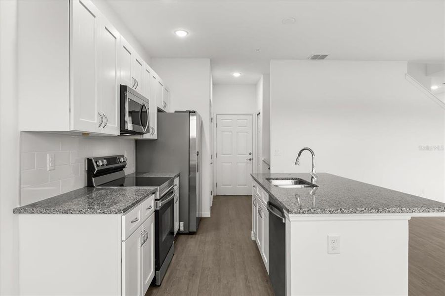 Furnished interior view inside a new home in , Clermont (Image 8). Furnished interior view inside a new home in , Clermont (Image 8).