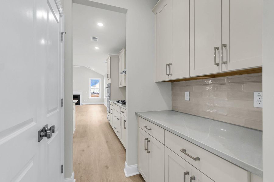 Furnished interior view inside a new home in Tidewater at Lakes of Cane Bay, Summerville (Image 4).