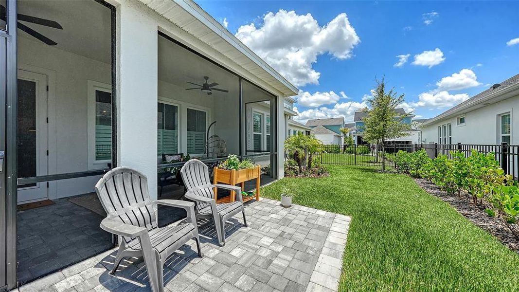 Exterior details and patio area of a home in Emerald Landing at Waterside at Lakewood Ranch – Lake Series, Sarasota (Image 26).