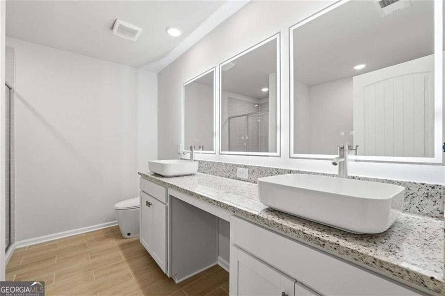 Furnished interior view inside a new home in Parkway James, Snellville (Image 8). Furnished interior view inside a new home in Parkway James, Snellville (Image 8).