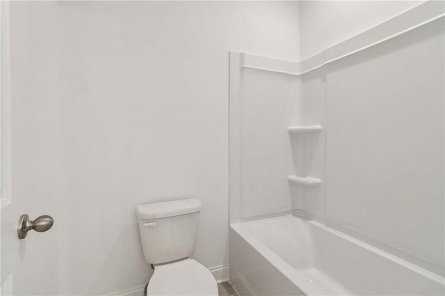 Furnished interior view inside a new home in East Harbor II at Chestatee, Dawsonville (Image 9).