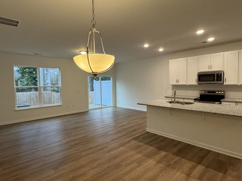 Spacious, unfurnished interior of a new home in East Main Townes, Spartanburg (Image 9).