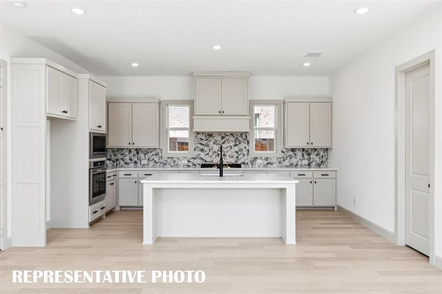 The spacious island is the hub of your new dream kitchen! REPRESENTATIVE PHOTO The spacious island is the hub of your new dream kitchen! REPRESENTATIVE PHOTO