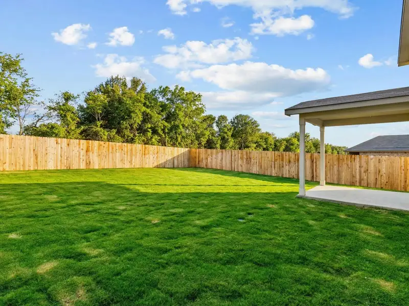 Exterior details and patio area of a home in Royal Crest, San Antonio (Image 3).