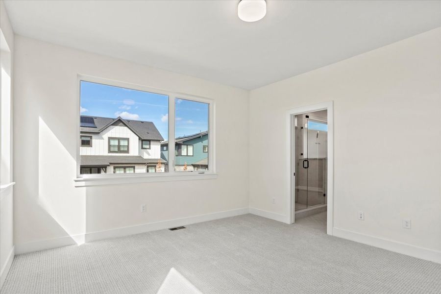 Spacious, unfurnished interior of a new home in West Grange, Longmont (Image 26).