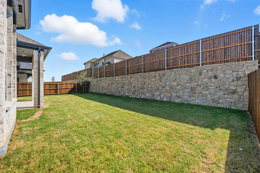 Exterior details and patio area of a home in Wildflower Ranch: Artisan Series - 60ft. lots, Dish (Image 17). Exterior details and patio area of a home in Wildflower Ranch: Artisan Series - 60ft. lots, Dish (Image 17).