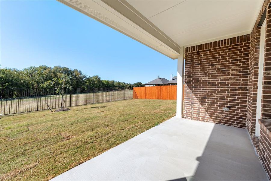 Exterior details and patio area of a home in Morningstar, Aledo (Image 3). Exterior details and patio area of a home in Morningstar, Aledo (Image 3).