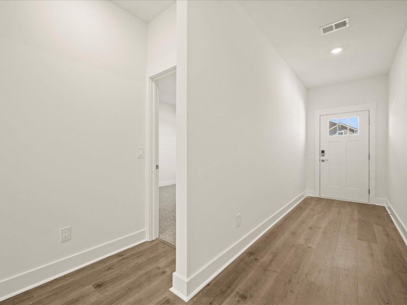 Spacious, unfurnished interior of a new home in The Coves at Lakes of Cane Bay, Summerville (Image 15). Spacious, unfurnished interior of a new home in The Coves at Lakes of Cane Bay, Summerville (Image 15).