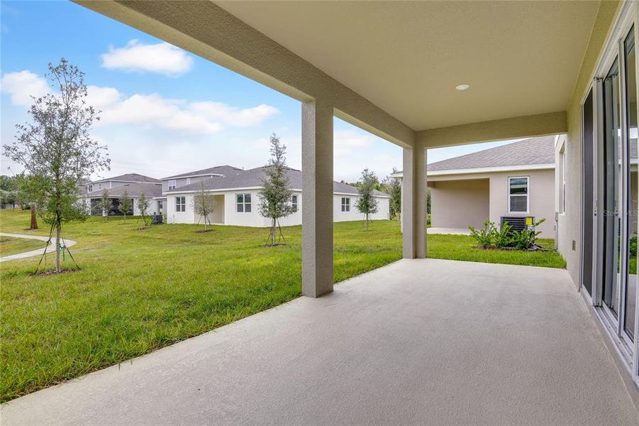 Exterior details and patio area of a home in Seasons at Grandview Gardens, Deland (Image 3). Exterior details and patio area of a home in Seasons at Grandview Gardens, Deland (Image 3).