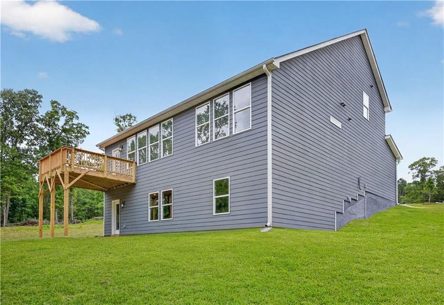 Exterior details and patio area of a home in Waters Edge, Mansfield (Image 15).