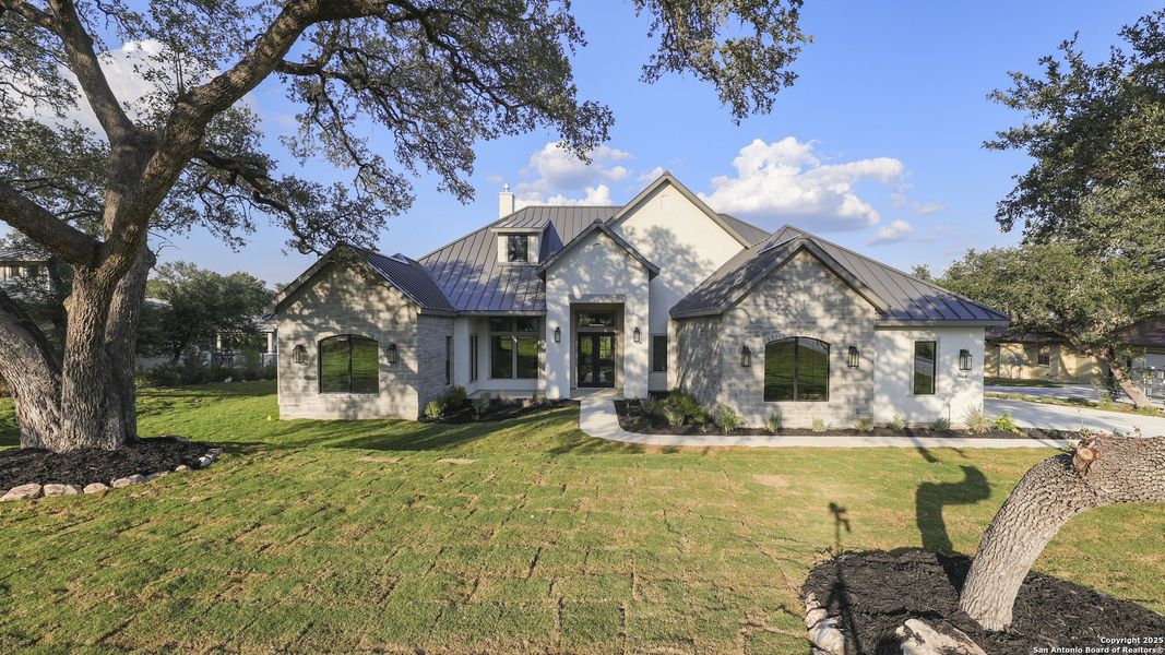 Front exterior of a new home in , New Braunfels, TX, highlighting curb appeal (Image 24).
