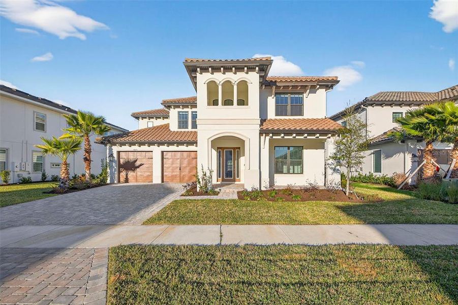 Front exterior of a new home in , Wesley Chapel, FL, highlighting curb appeal (Image 30).