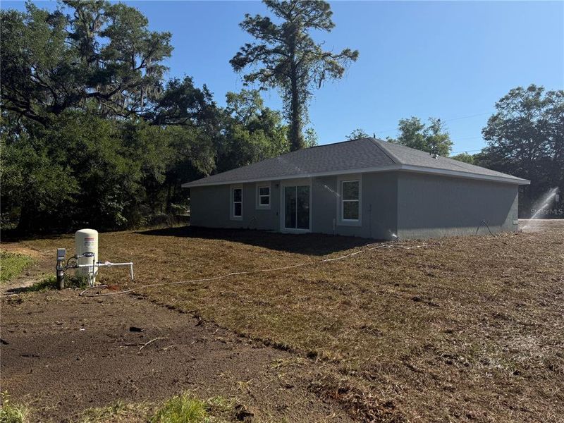 Exterior details and patio area of a home in , Ocala (Image 3).