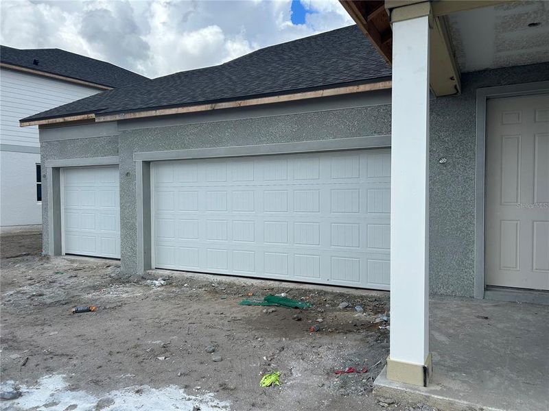 In-progress construction of a new home in Oakfield Trails Signature, Parrish, FL (Image 33).