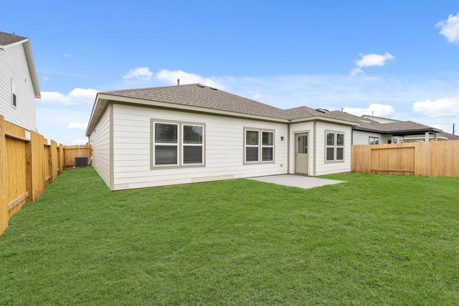 Exterior details and patio area of a home in Trails at Woodhaven, La Marque (Image 3).