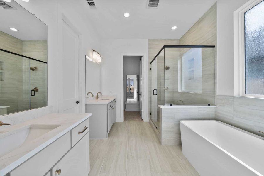 Representative furnished interior of a home built from the Summerton by Chesmar Homes in Grange, Katy (Image 10).