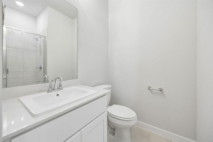 Bathroom in the Oscar home plan by Trophy Signature Homes – REPRESENTATIVE PHOTO Bathroom in the Oscar home plan by Trophy Signature Homes – REPRESENTATIVE PHOTO