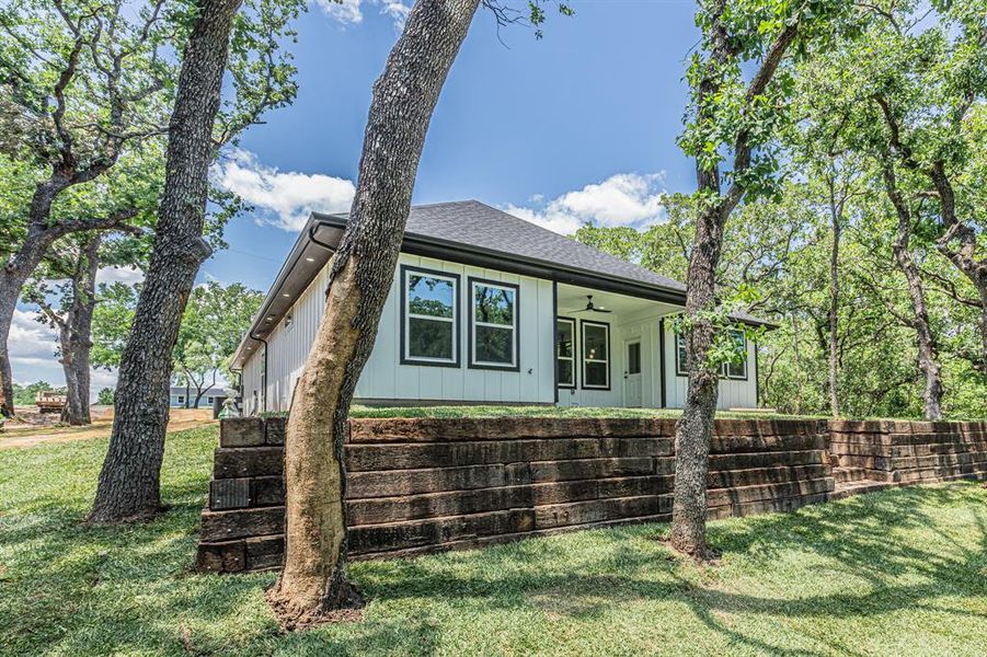 Exterior details and patio area of a home in , Runaway Bay (Image 24).