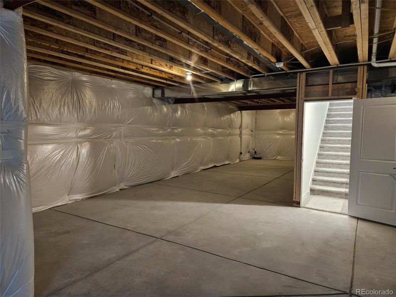 In-progress construction of a new home in The Cottages Collection at Ridgeline Vista, Brighton, CO (Image 19).