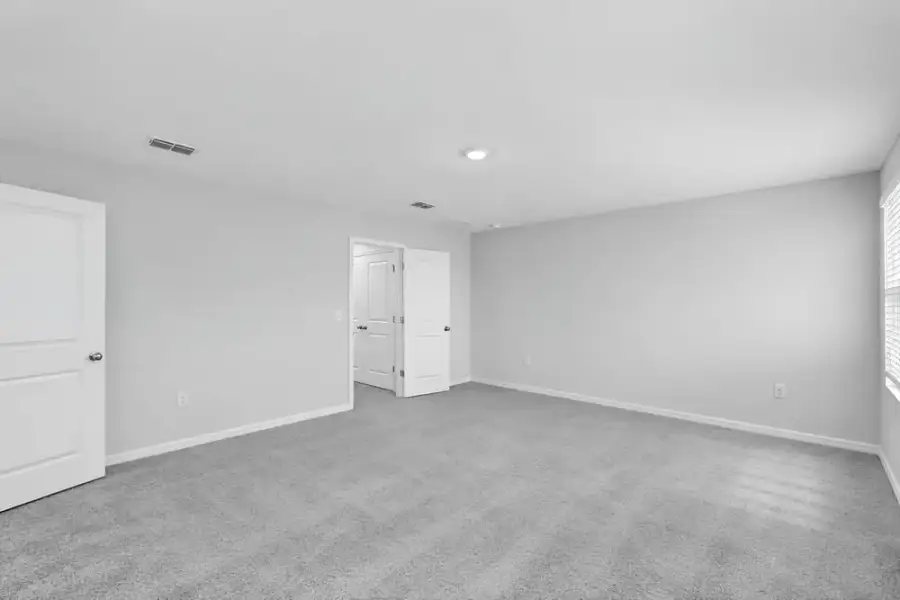 Representative unfurnished interior of a home built from the Dove by Taylor Morrison in Azure at Solaeris, Port St. Lucie (Image 28).