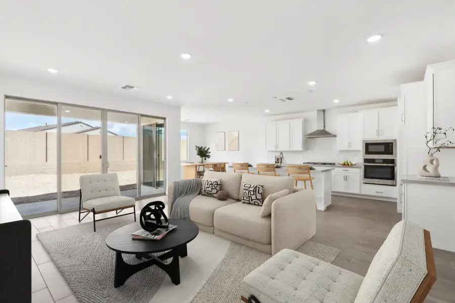 Great room, Gourmet kitchen & dining - Timeless Collection. Virtually staged. Finishes may vary