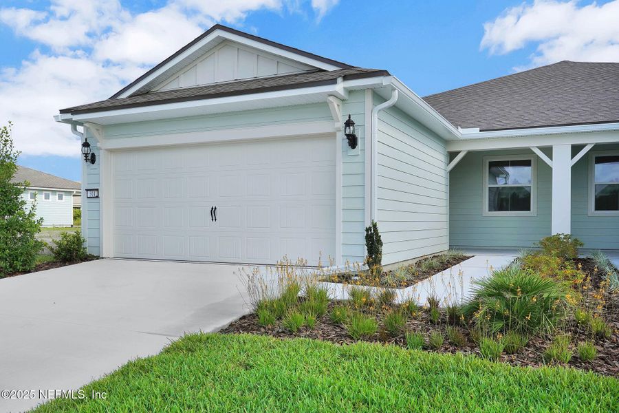 Exterior details and patio area of a home in Del Webb Wildlight, Yulee (Image 20).