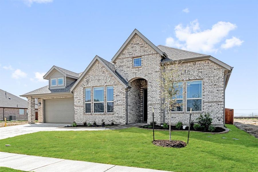 Front exterior of a new home in Sunset Ridge, Alvarado, TX, highlighting curb appeal (Image 24). Front exterior of a new home in Sunset Ridge, Alvarado, TX, highlighting curb appeal (Image 24).