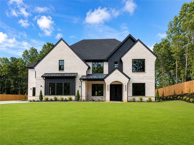 Front exterior of a new home in , Hoschton, GA, highlighting curb appeal (Image 1). Front exterior of a new home in , Hoschton, GA, highlighting curb appeal (Image 1).