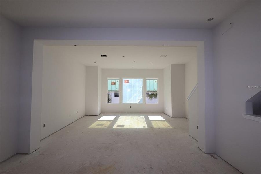 In-progress construction of a new home in Towns at Union, St. Petersburg, FL (Image 10).