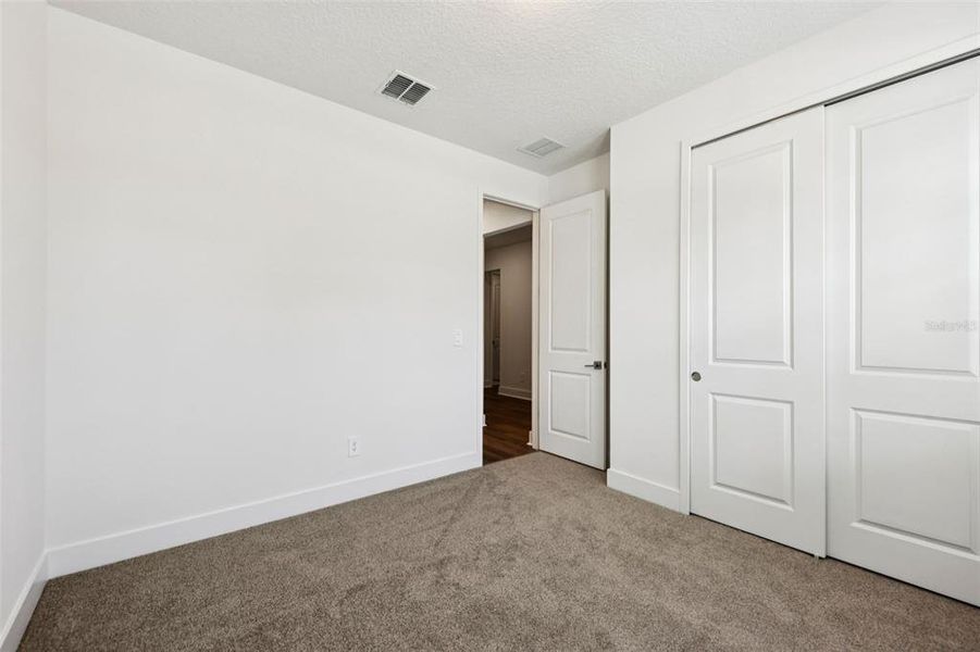 Spacious, unfurnished interior of a new home in Ridgehaven - Signature Series, Ormond Beach (Image 26).