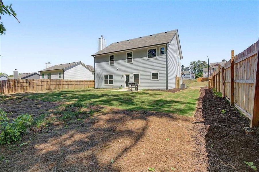 Exterior details and patio area of a home in Traditions at Cedarcrest, Dallas (Image 21).