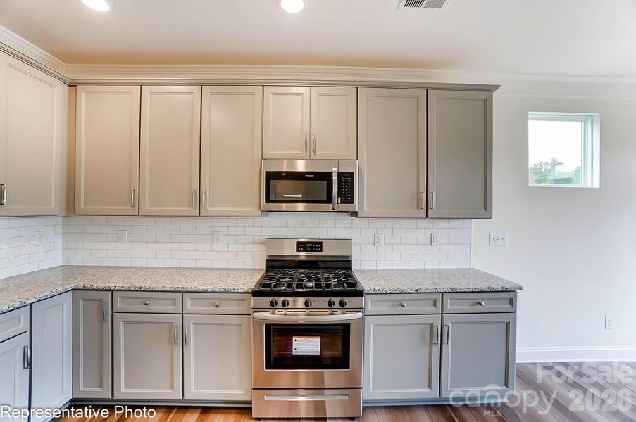 Furnished interior view inside a new home in Ashton Park, Monroe (Image 7).
