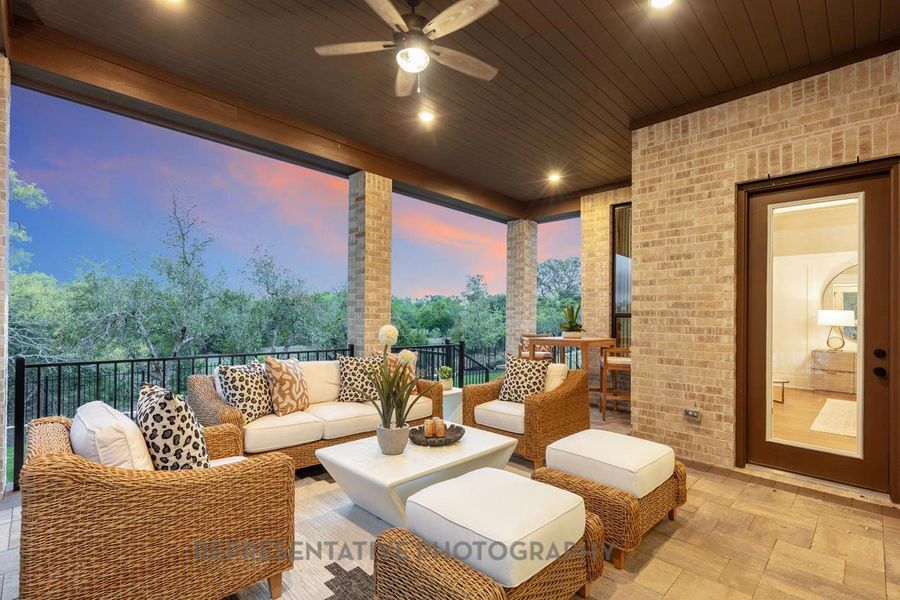 Exterior details and patio area of a home in The Woodlands Hills, Willis (Image 2).