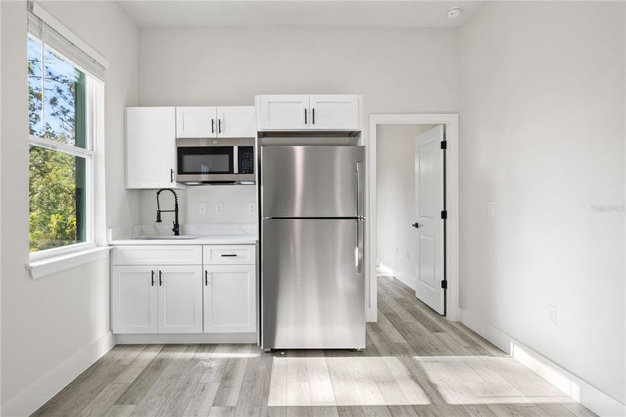Furnished interior view inside a new home in , Ocala (Image 18).