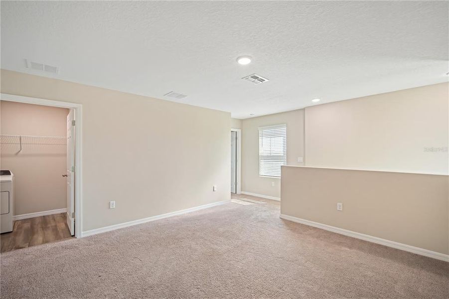 Spacious, unfurnished interior of a new home in Crosswind Point, Parrish (Image 19). Spacious, unfurnished interior of a new home in Crosswind Point, Parrish (Image 19).