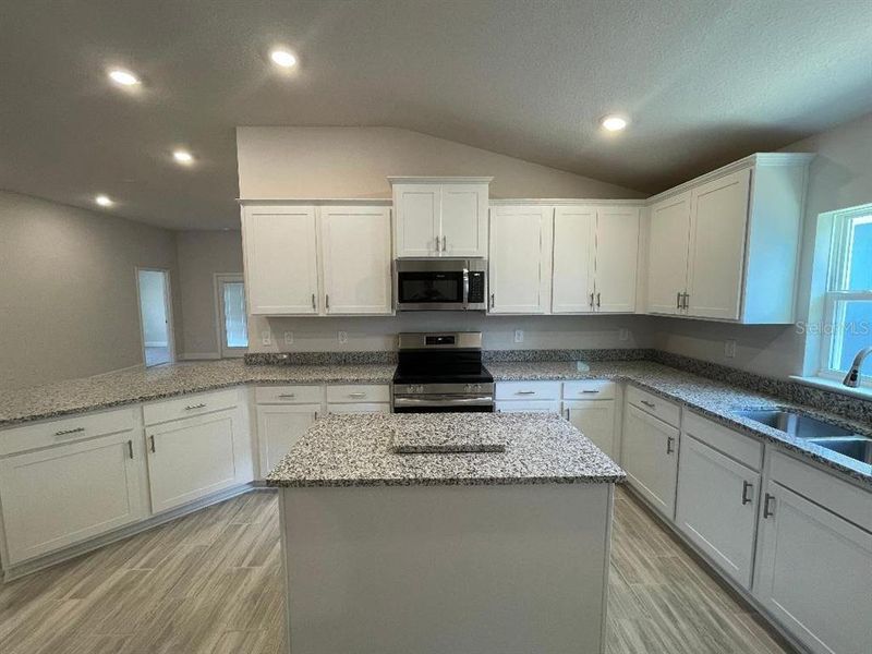 Furnished interior view inside a new home in Abbey Glen, Dade City (Image 6).
