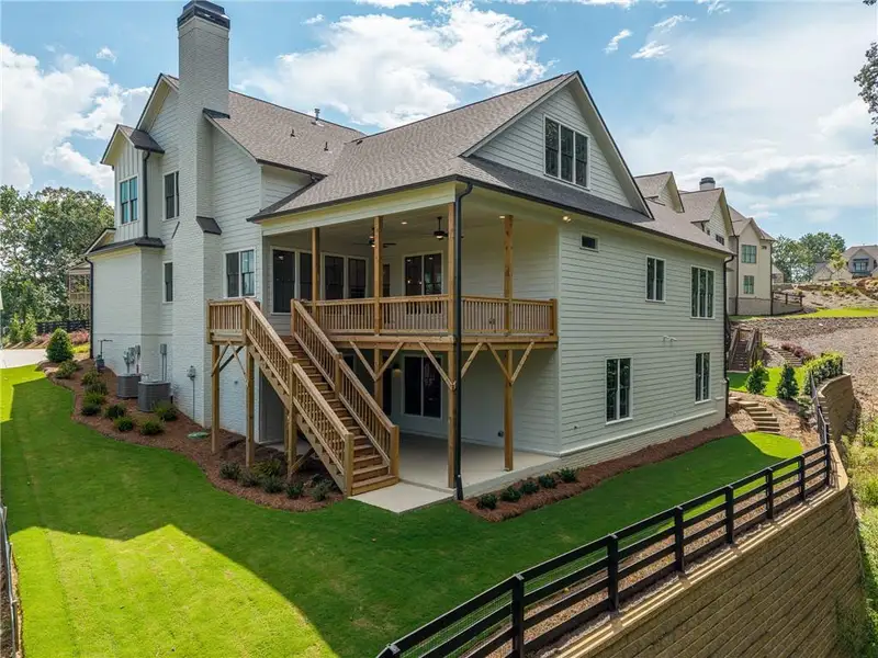 Exterior details and patio area of a home in Malone's Pond, Ball Ground (Image 22).